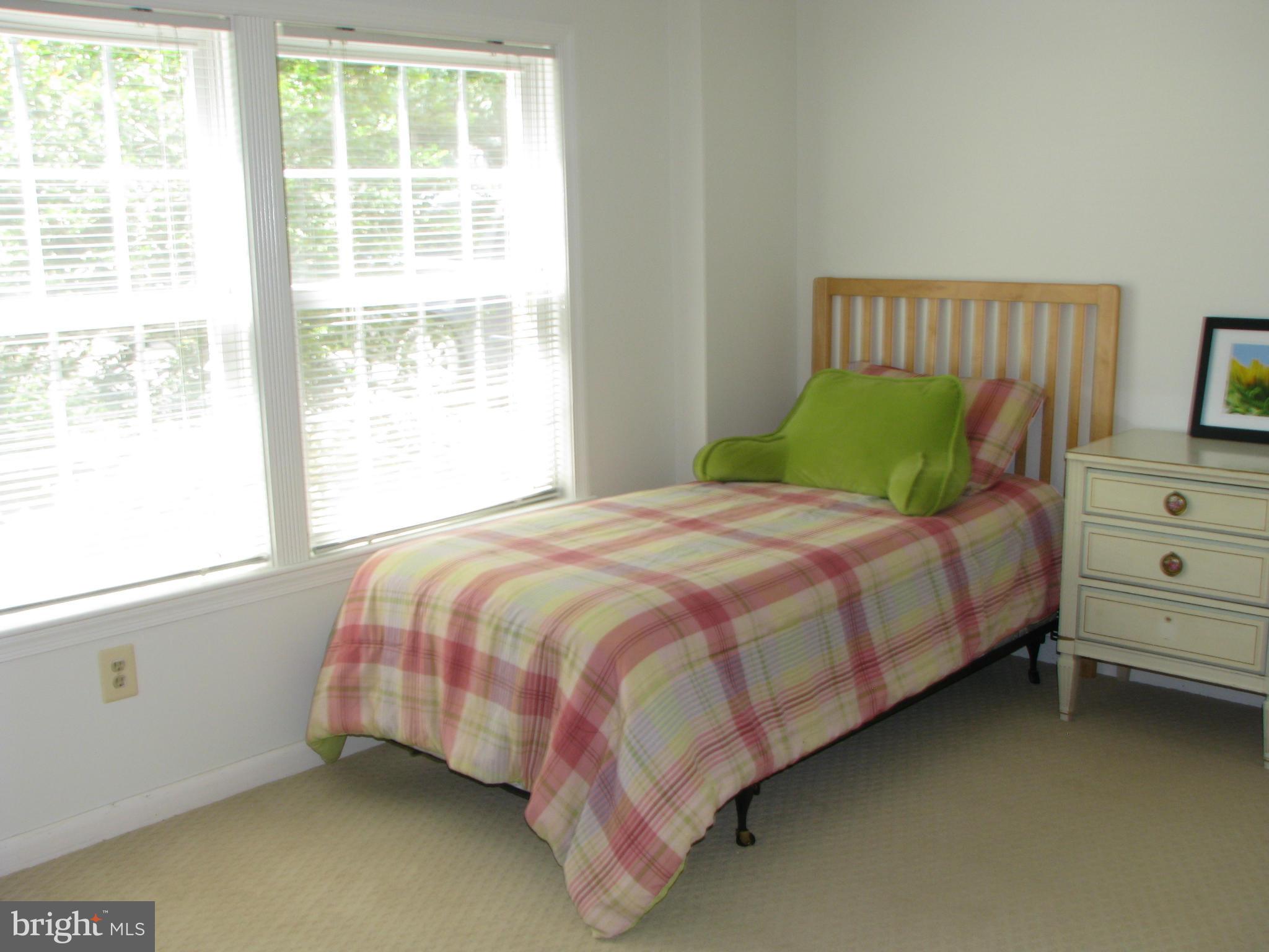 4207 Jackson Mill Road Haymarket, VA 20169 - Photo 21 of 30 a bedroom with a bed and window