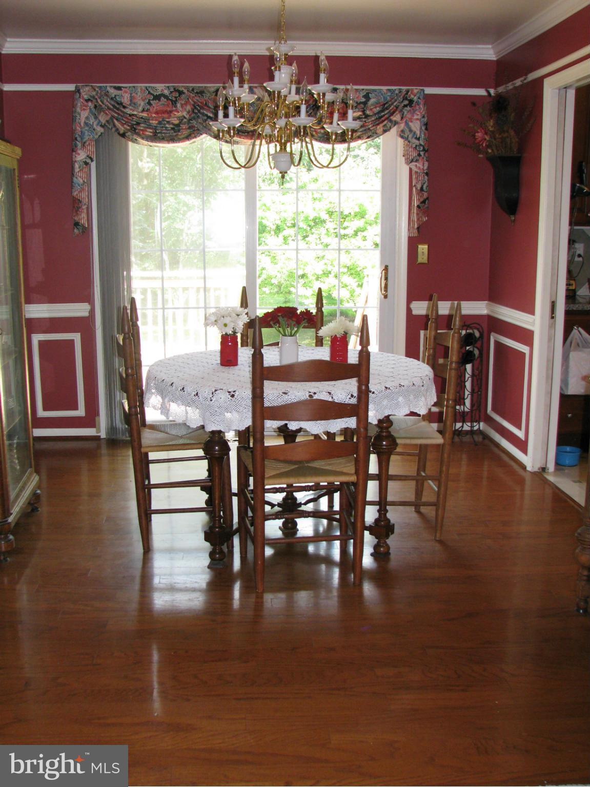 4207 Jackson Mill Road Haymarket, VA 20169 - Photo 7 of 30 a view of a dining room with furniture window and wooden floor