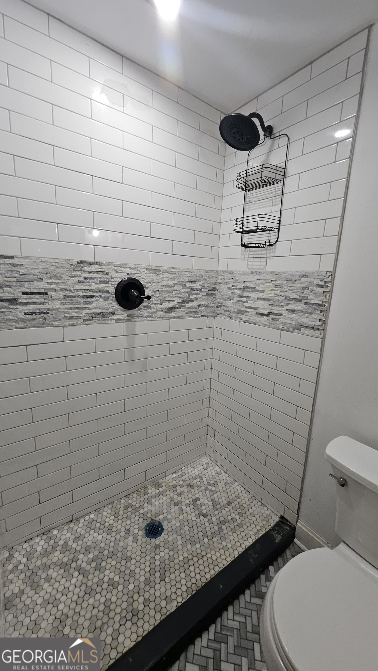 2197 Polar Rock Place Southwest Atlanta, GA 30315 - Photo 6 of 9 a bathroom with a shower