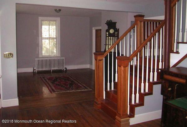 80 Elizabeth Street Keyport, NJ 07735 - Photo 3 of 6 a view of entryway and hall with wooden floor