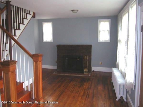 80 Elizabeth Street Keyport, NJ 07735 - Photo 4 of 6 a view of an entryway with wooden floor