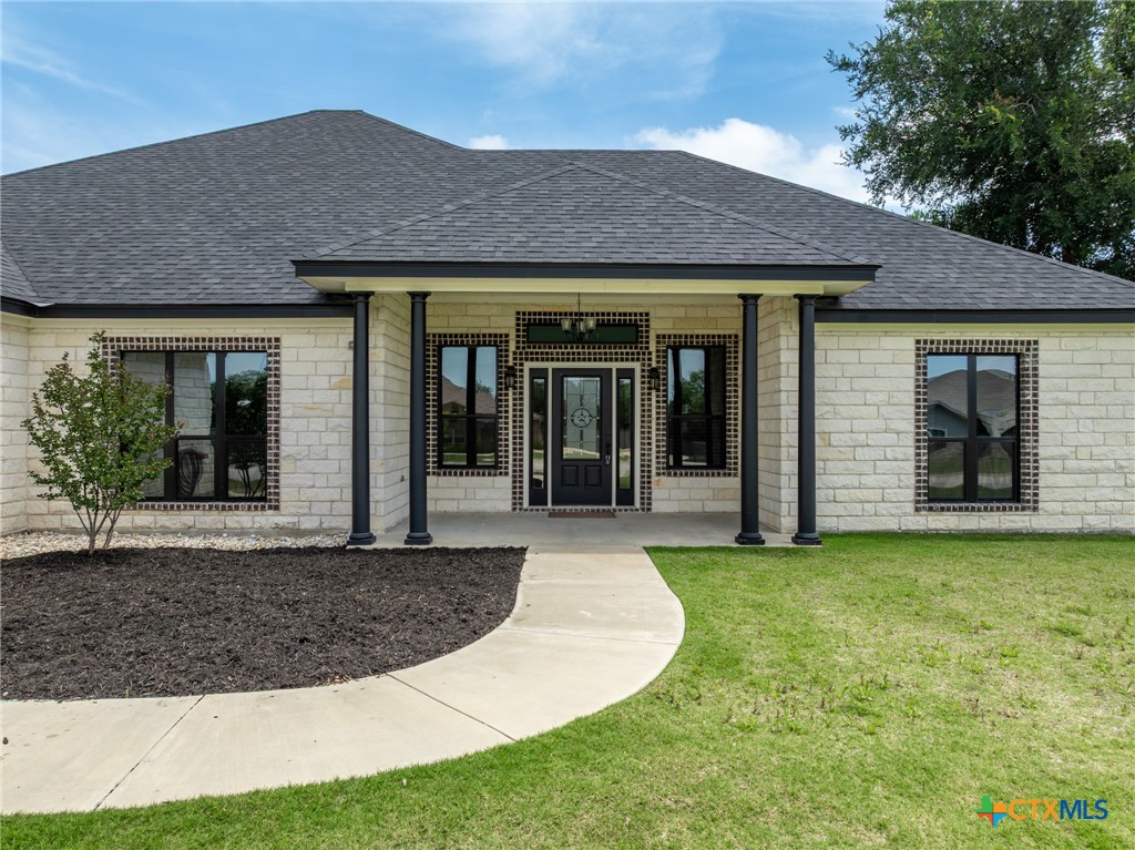 2892 Beulah Boulevard Belton, TX 76513 - Photo 2 of 47 a front view of a house with garden