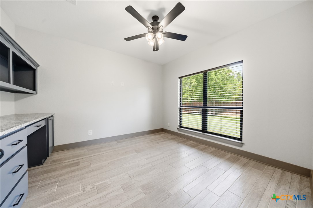 2892 Beulah Boulevard Belton, TX 76513 - Photo 25 of 47 a view of an empty room with a kitchen