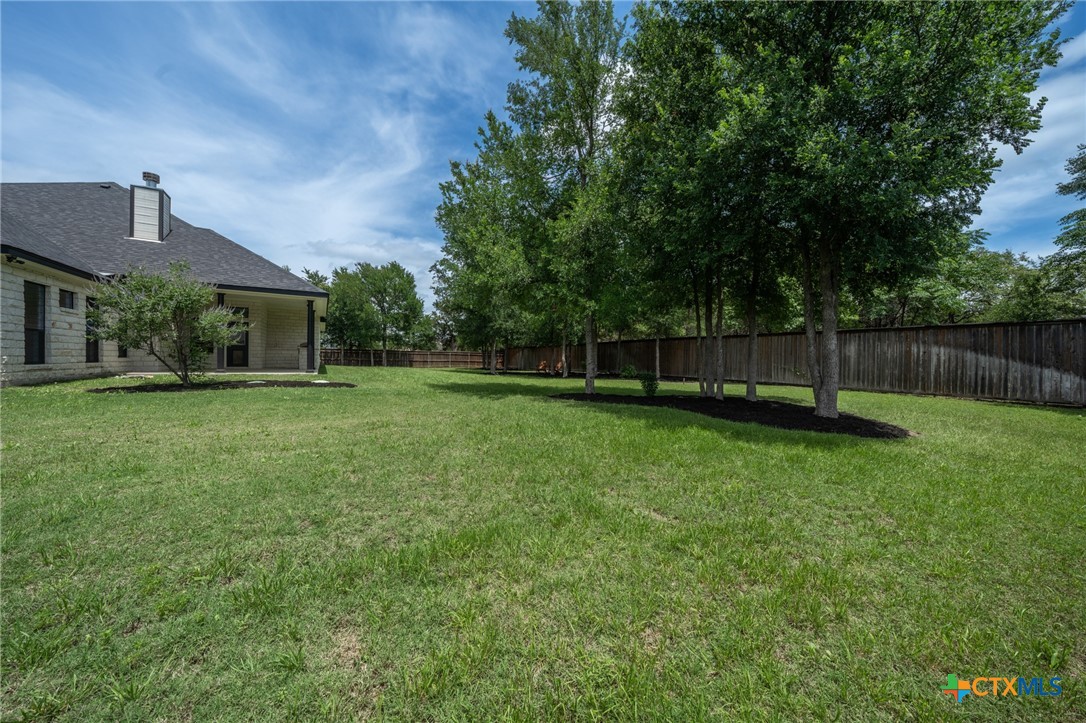 2892 Beulah Boulevard Belton, TX 76513 - Photo 38 of 47 a backyard of a house with lots of green space