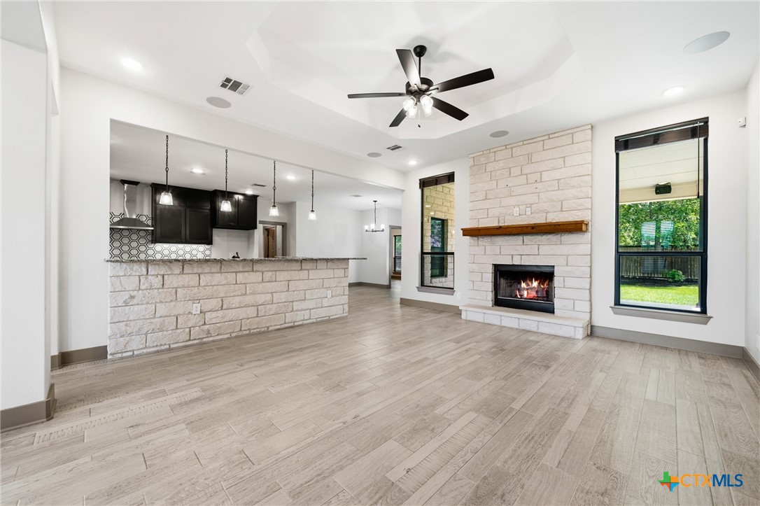 2892 Beulah Boulevard Belton, TX 76513 - Photo 5 of 47 a view of an empty room with a fireplace and a window