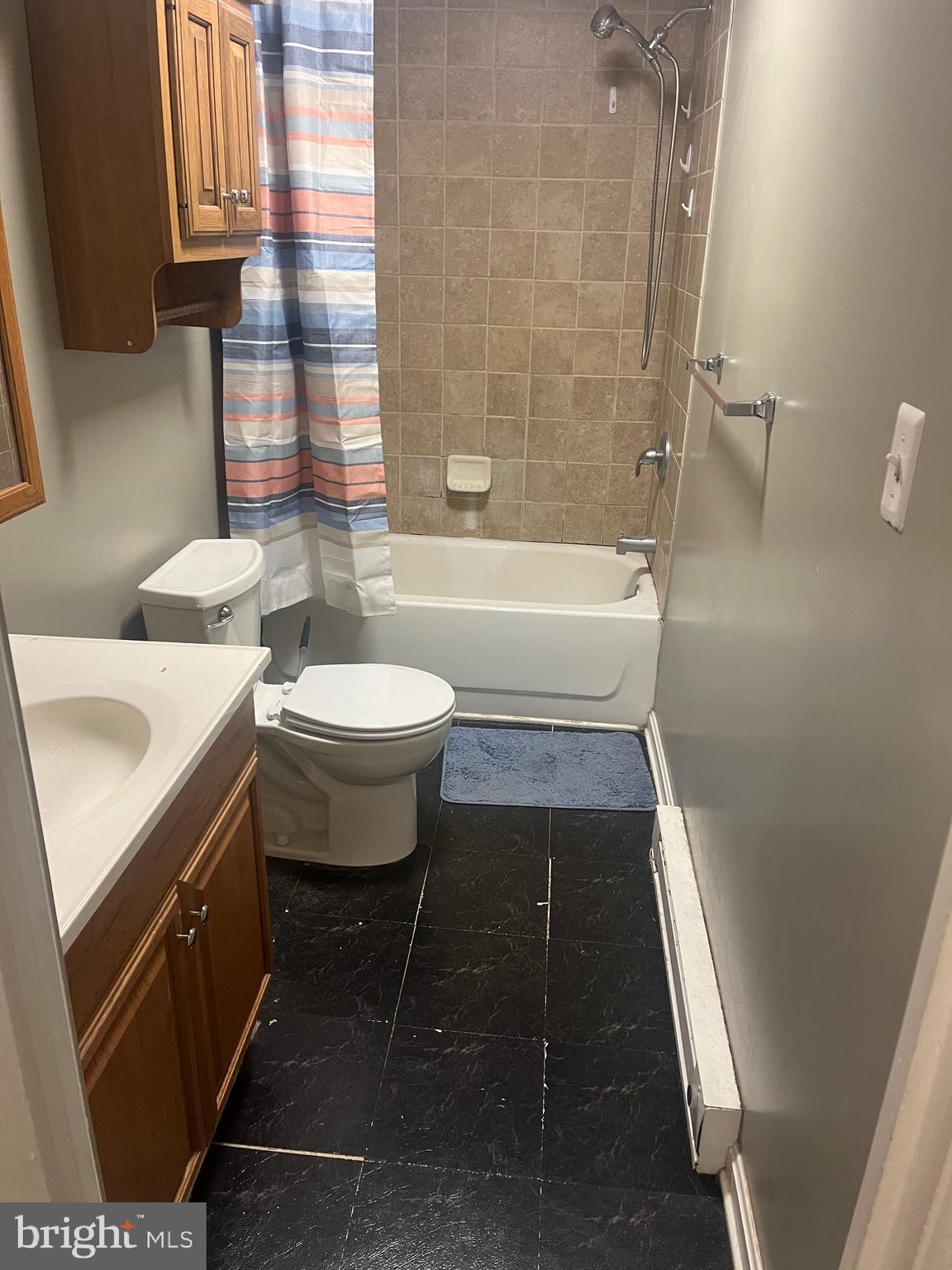 17830 Sherman Avenue Hagerstown, MD 21740 - Photo 13 of 18 a bathroom with a sink and a bathtub