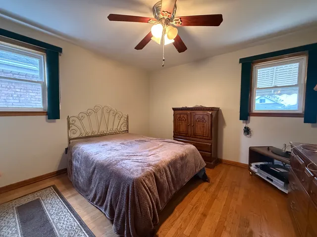 a view of a livingroom with furniture and cabinets