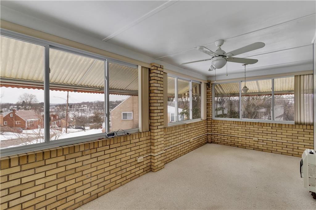 2 Hallmark Drive Pittsburgh, PA 15235 - Photo 18 of 32 20x9 Sunroom / Enclosed Porch off the Kitchen with Ceiling Fan.