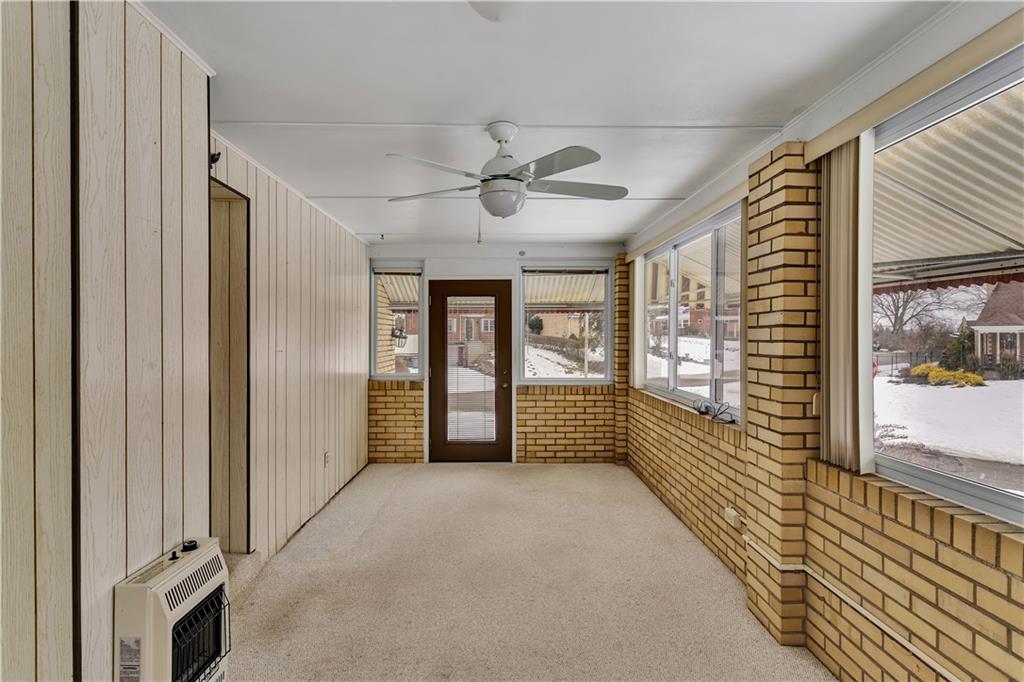 2 Hallmark Drive Pittsburgh, PA 15235 - Photo 19 of 32 Access to Front / Side Yard. Wall Heater and Awnings Allow for Year Round Enjoyment and Relaxing.