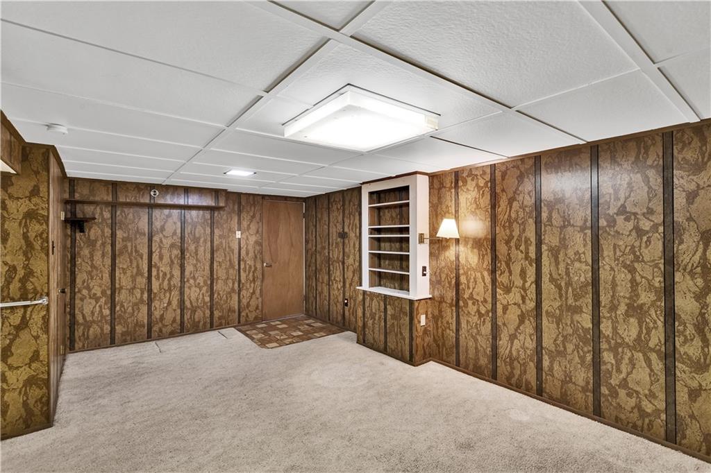 2 Hallmark Drive Pittsburgh, PA 15235 - Photo 26 of 32 Another View of the Finished Lower Level Gameroom. Door Opens to Garage.