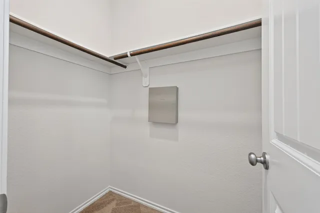 a view of a house with backyard and garden