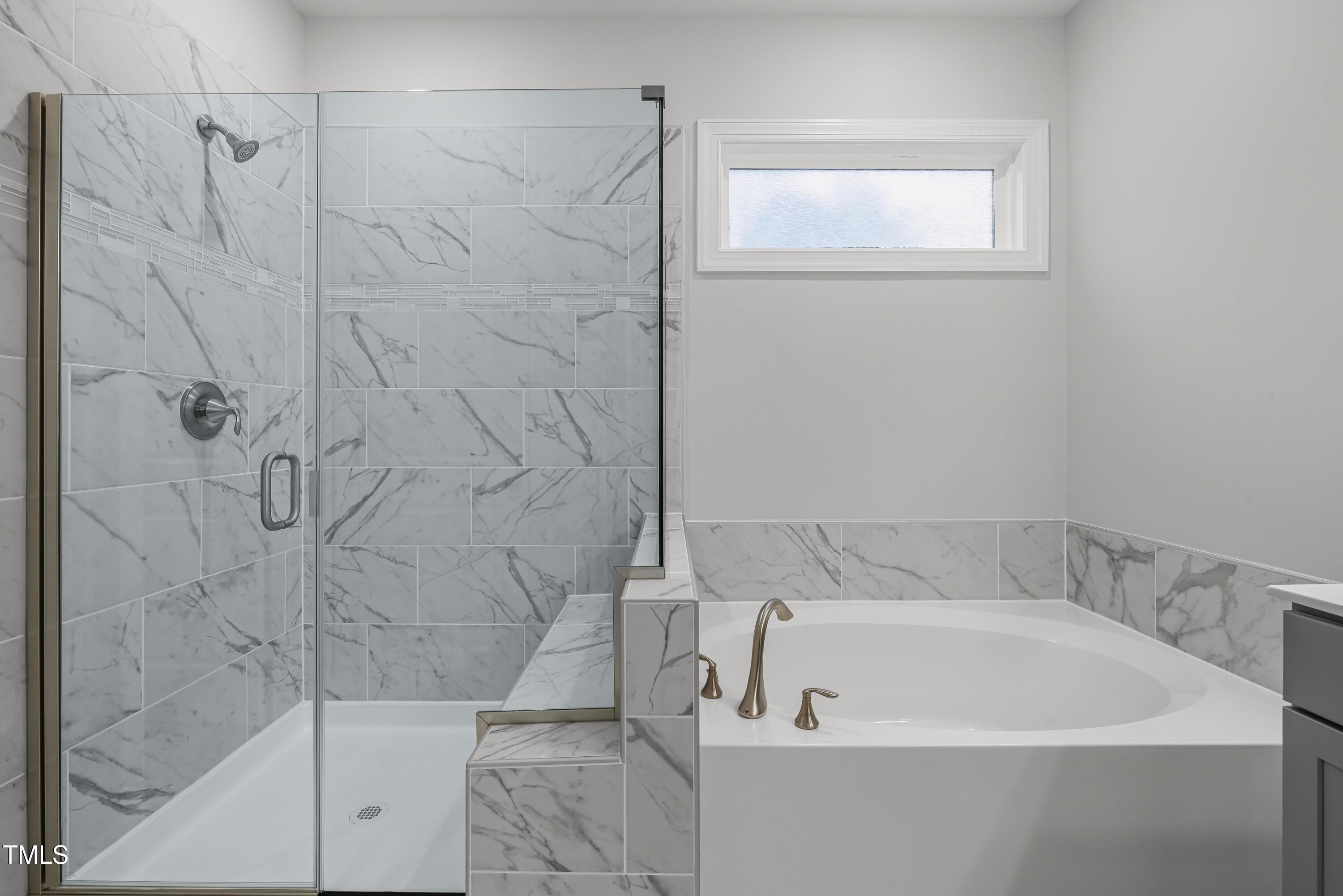 2005 Mavin Place Durham, NC 27703 - Photo 14 of 26 a bathroom with a bathtub