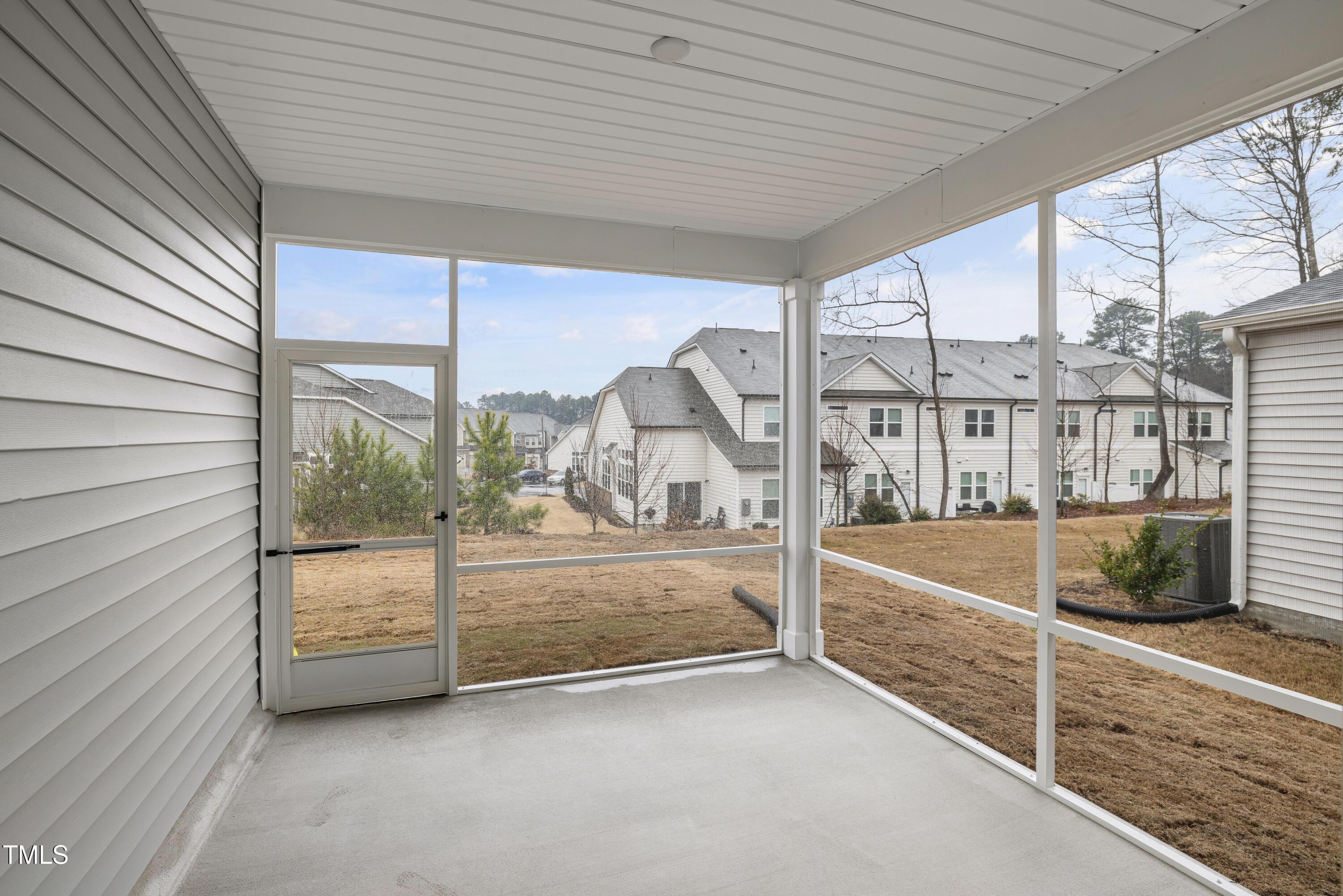 2005 Mavin Place Durham, NC 27703 - Photo 20 of 26 a view of a balcony with floor to ceiling window with an outdoor view