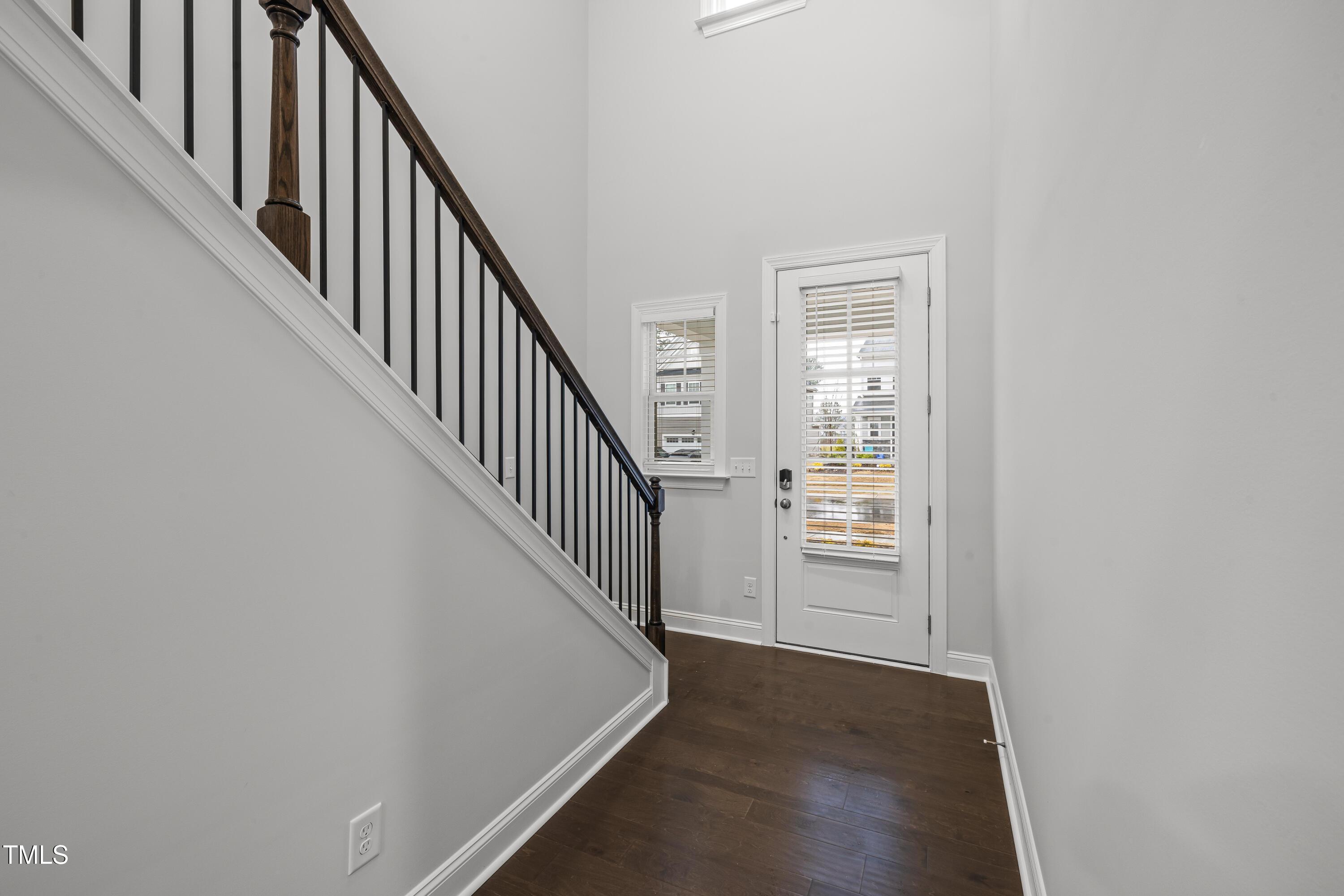 2005 Mavin Place Durham, NC 27703 - Photo 2 of 26 a view of an entryway with wooden floor