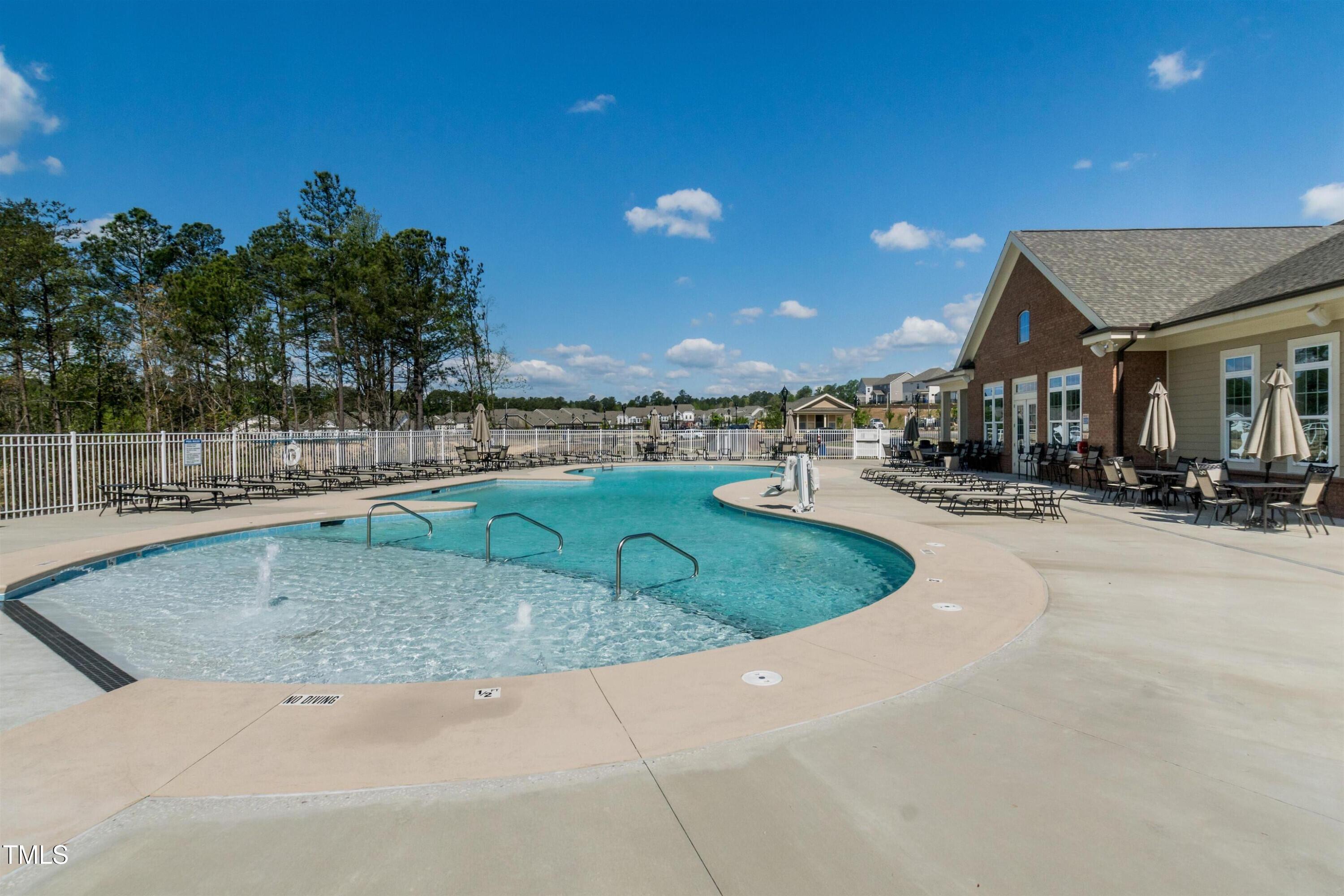 2005 Mavin Place Durham, NC 27703 - Photo 21 of 26 a view of a house with a swimming pool
