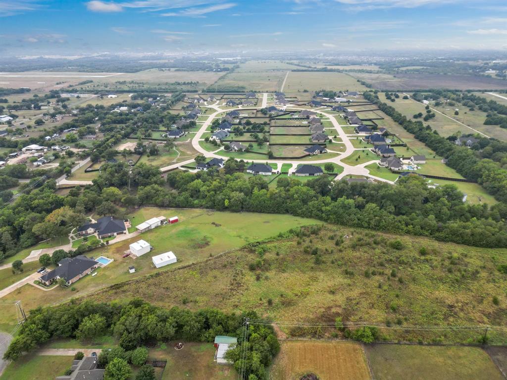 1061 Blackchamp Road Waxahachie, TX 75167 - Photo 11 of 22 an aerial view of residential houses with outdoor space