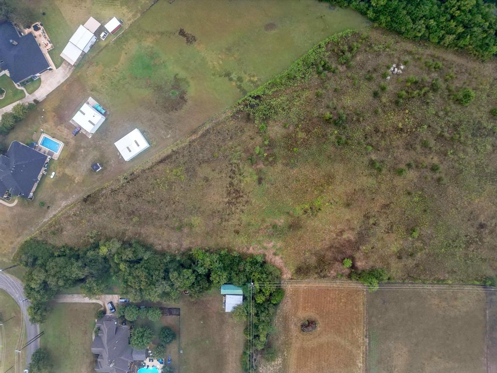 1061 Blackchamp Road Waxahachie, TX 75167 - Photo 12 of 22 an aerial view of a house