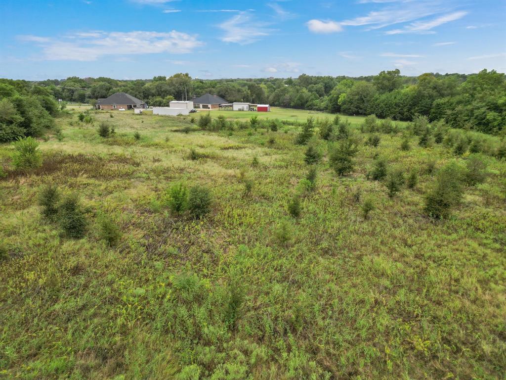 1061 Blackchamp Road Waxahachie, TX 75167 - Photo 19 of 22 a view of an outdoor space with a lake view