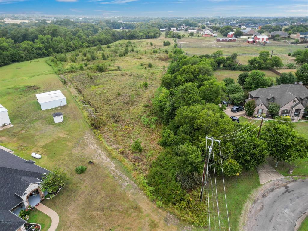 1061 Blackchamp Road Waxahachie, TX 75167 - Photo 3 of 22 an aerial view of a house with a yard