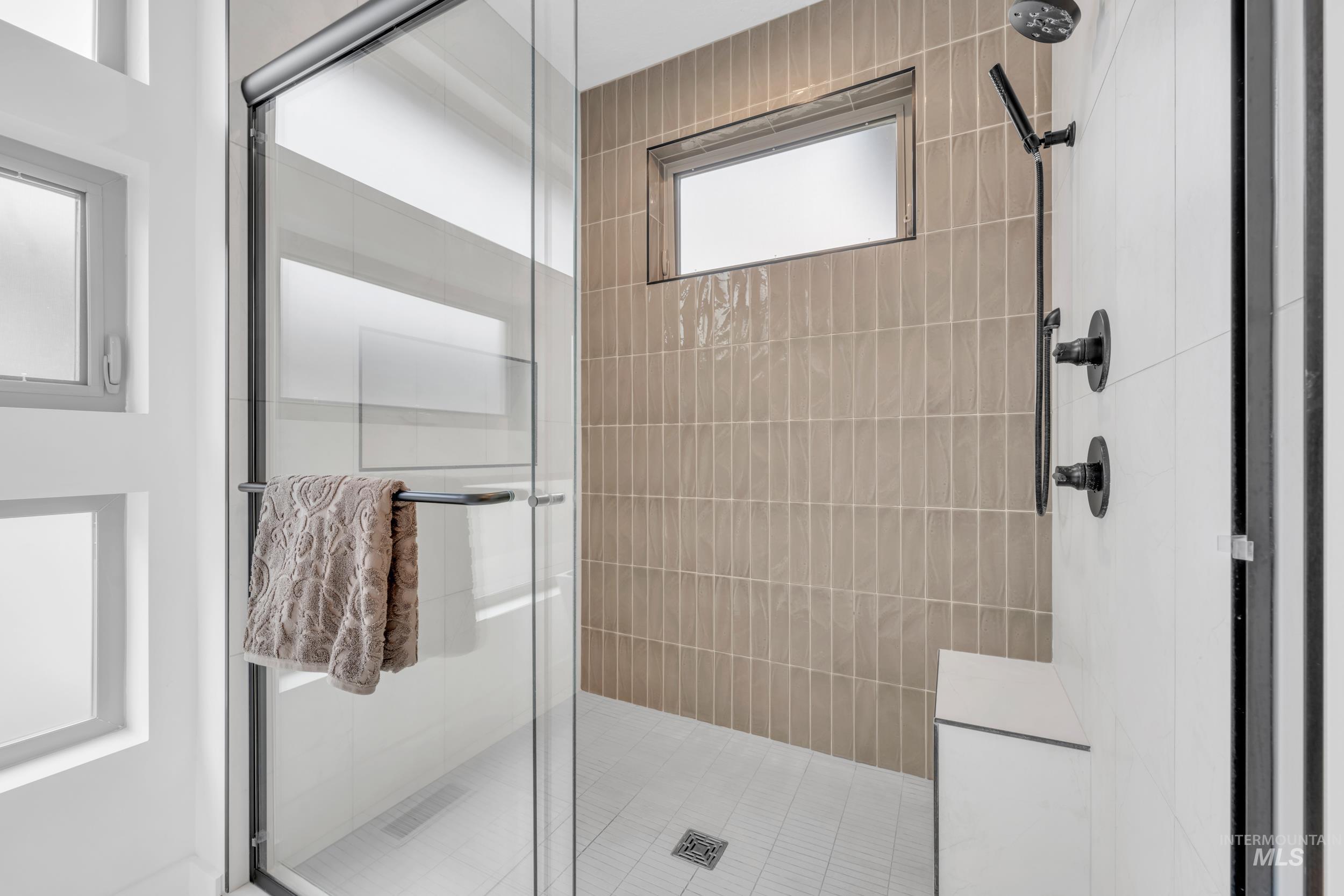 4447 East Copper Point Drive Meridian, ID 83642 - Photo 25 of 42 Bathroom featuring a shower stall