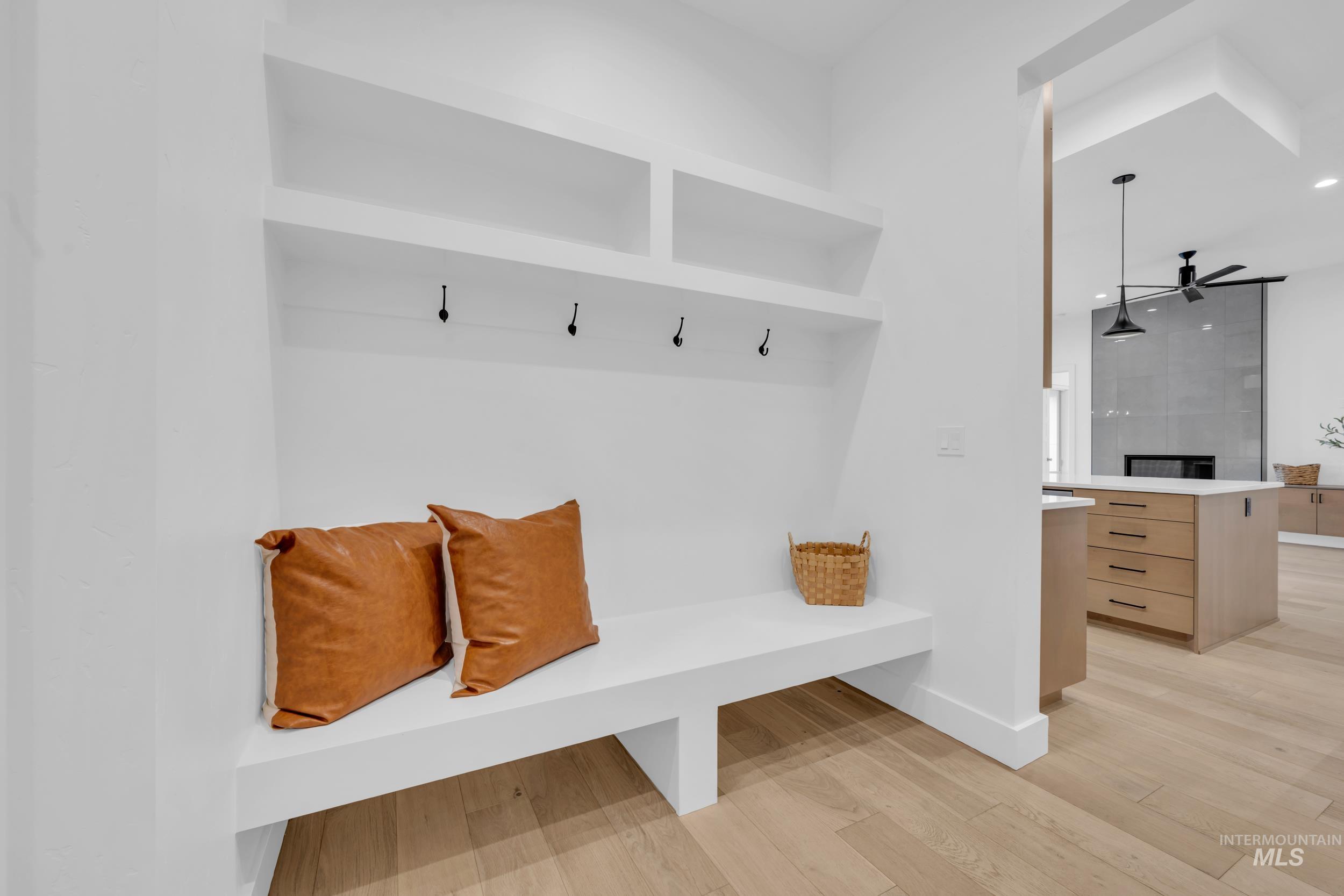 4447 East Copper Point Drive Meridian, ID 83642 - Photo 28 of 42 Mudroom with light wood-style floors, ceiling fan, and recessed lighting