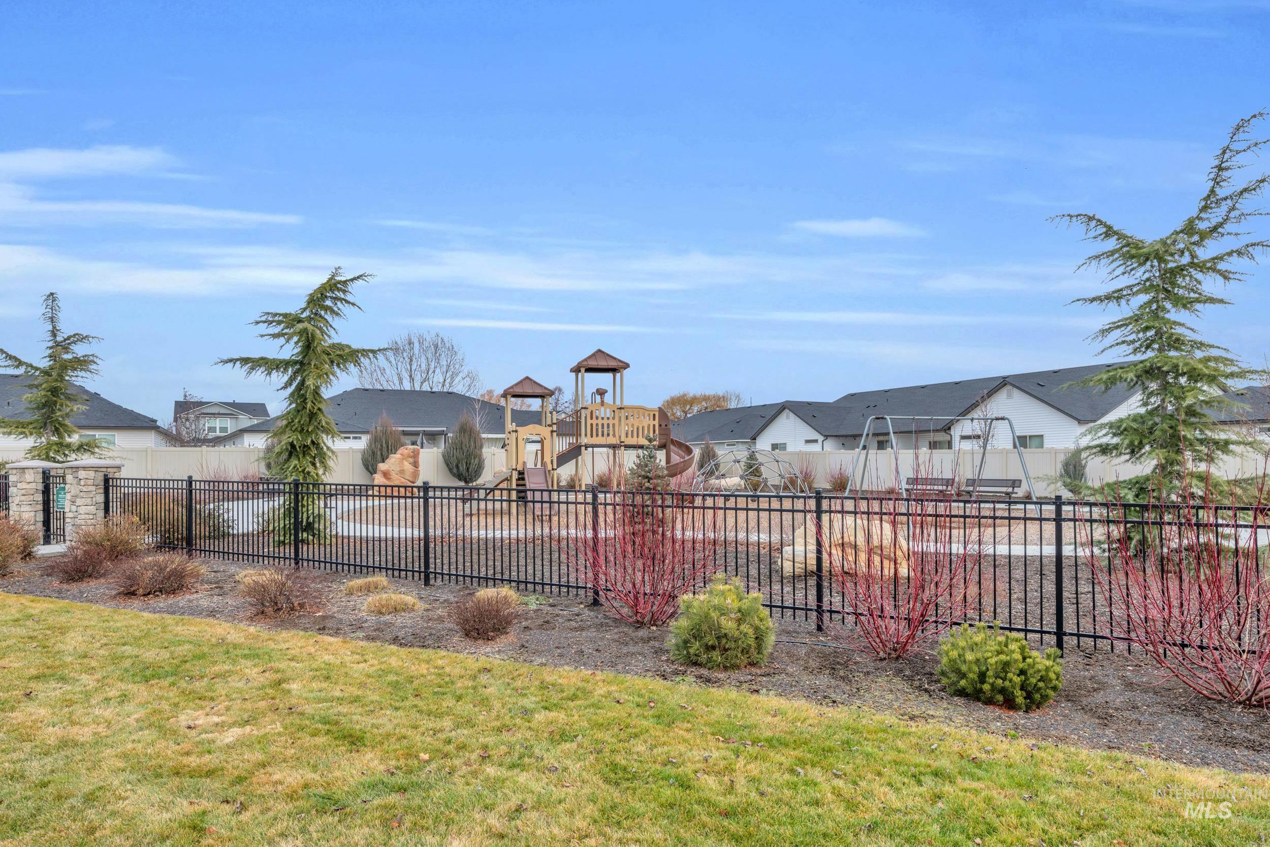 4447 East Copper Point Drive Meridian, ID 83642 - Photo 41 of 42 View of jungle gym featuring a residential view
