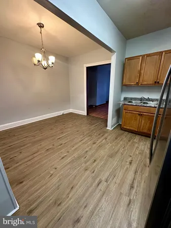 a view of a livingroom with wooden floor