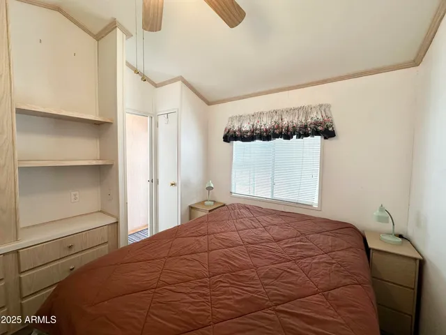 a white refrigerator freezer and a stove sitting inside of a kitchen