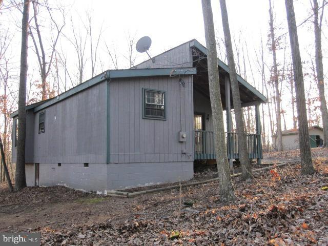 358 Getaway Road Hedgesville, WV 25427 - Photo 1 of 23 Exterior left side and rear of home