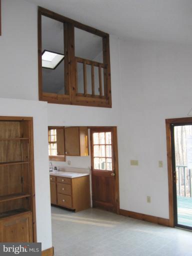 358 Getaway Road Hedgesville, WV 25427 - Photo 5 of 23 view of kitchen with loft with skylight above