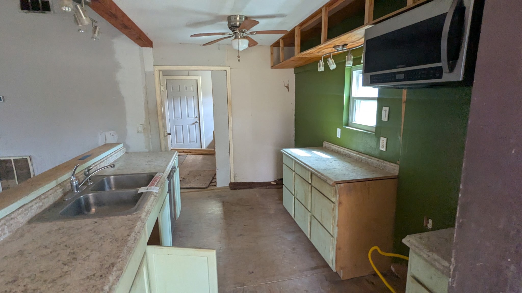 24571 Vale Lane Porter, TX 77365 - Photo 7 of 10 a hallway with a washer and dryer