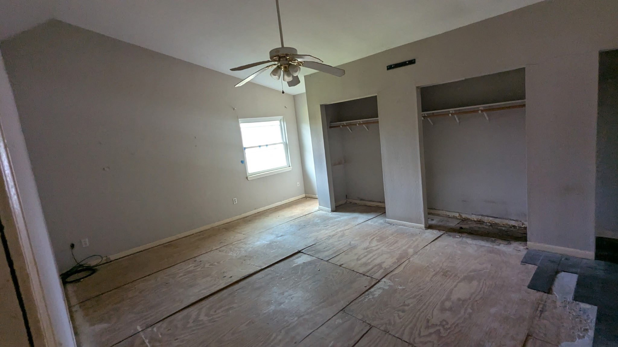 24571 Vale Lane Porter, TX 77365 - Photo 10 of 10 a view of an empty room with window and chandelier fan