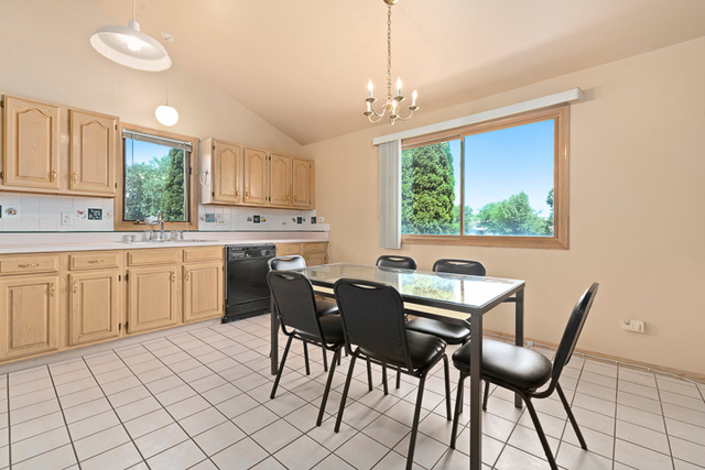 2174 Cimarron Way Addison, IL 60101 - Photo 12 of 19 a view of a dining room with furniture window and outside view