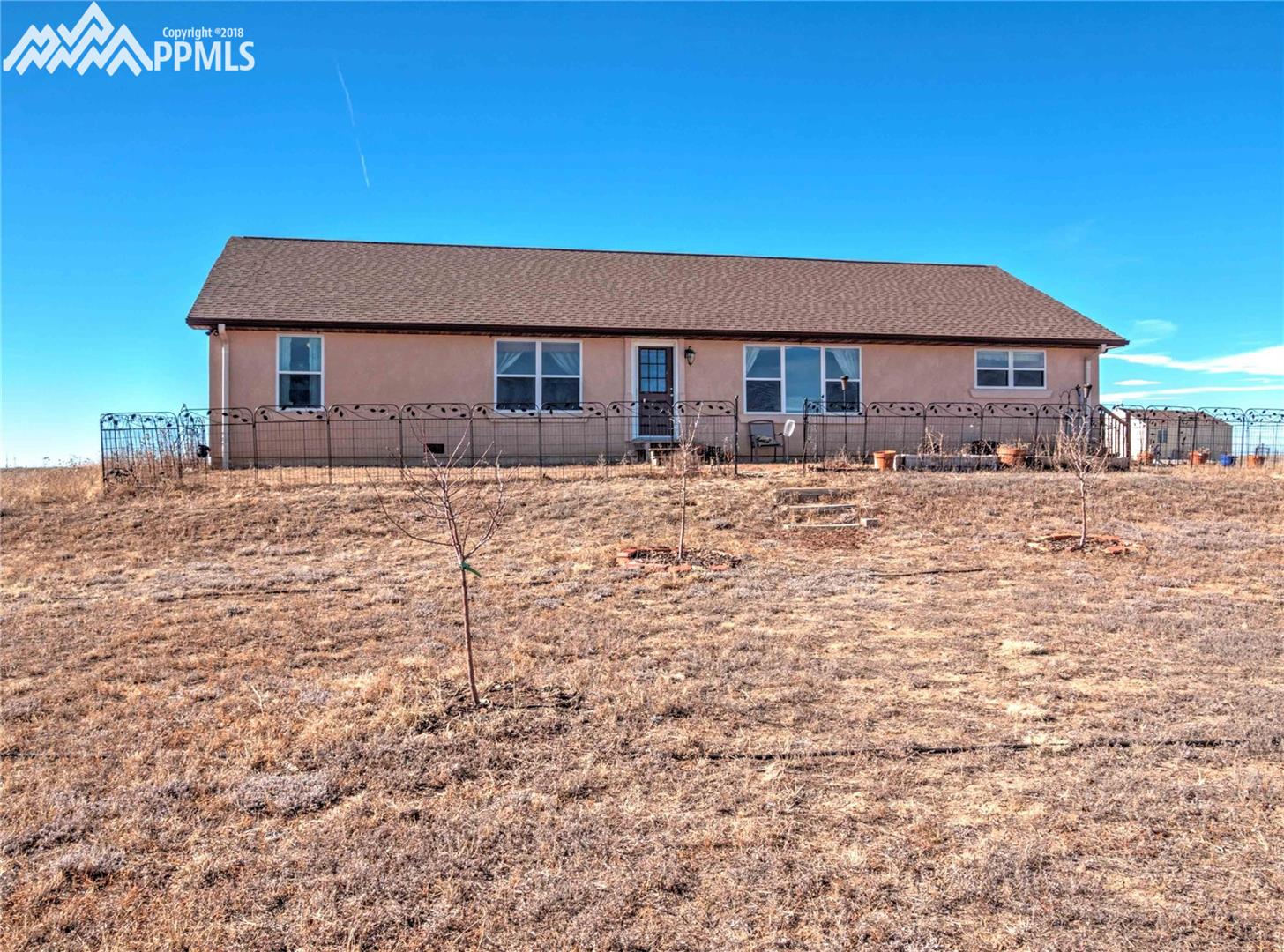 40250 Alford Road Simla, CO 80835 - Photo 1 of 26 Lovely stucco home, the front faces east.