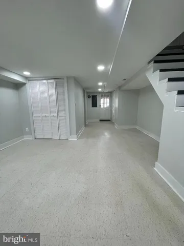 a bathroom with a sink a toilet and bathtub