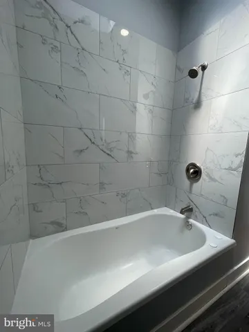 a bathroom with a bathtub