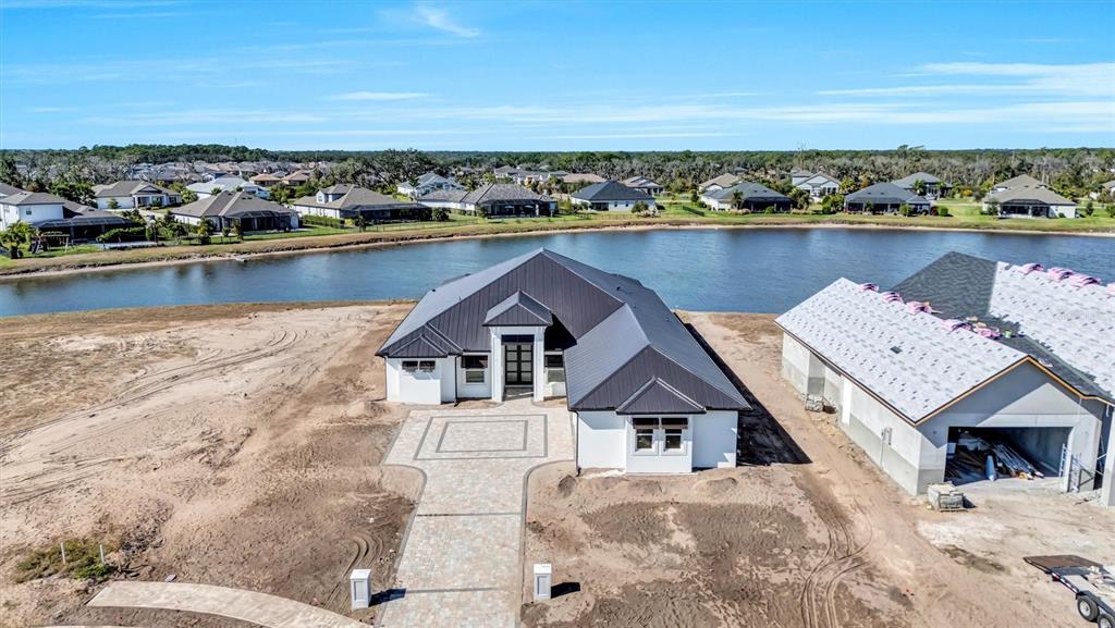 1613 148th Terrace East Parrish, FL 34219 - Photo 4 of 81 a view of a terrace with a lake view