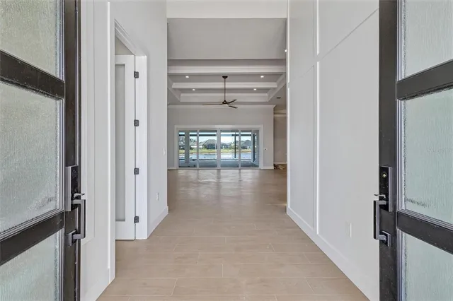 a spacious bathroom with a sink mirror and a bath tub