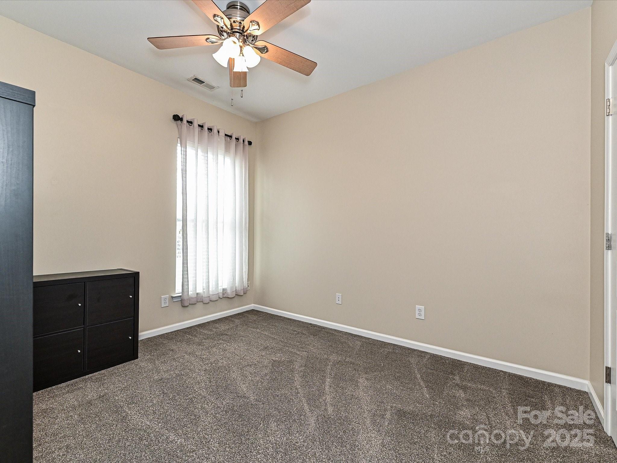 460 Silver Cypress Lane Fort Mill, SC 29708 - Photo 18 of 29 a view of an empty room with a window