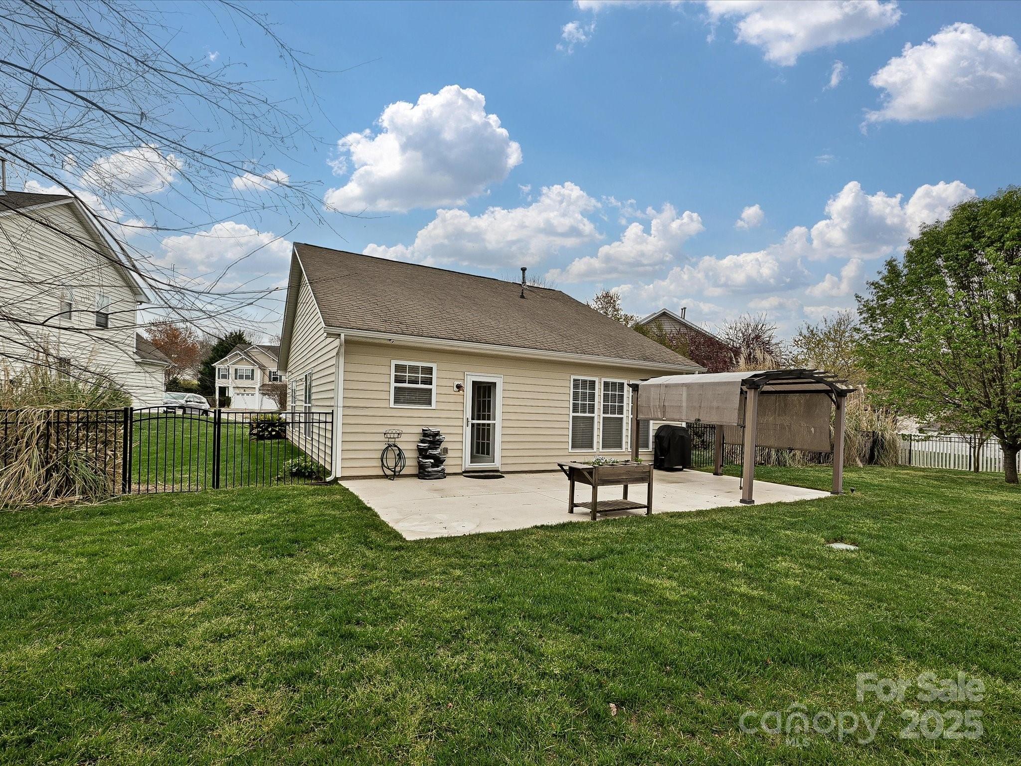460 Silver Cypress Lane Fort Mill, SC 29708 - Photo 23 of 29 a view of a house with backyard and sitting area