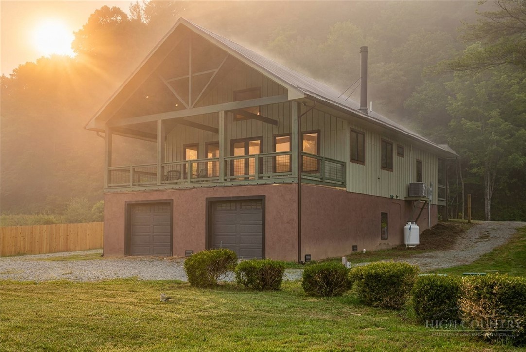 790 Howard Edmisten Road Sugar Grove, NC 28679 - Photo 41 of 45 a house with a swimming pool