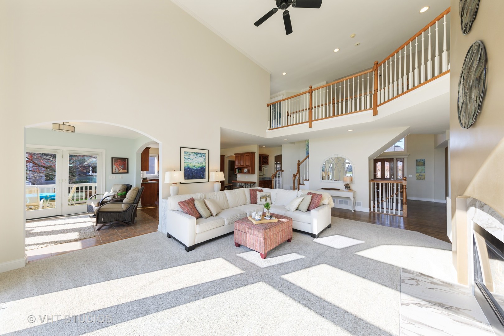 3651 White Eagle Drive Naperville, IL 60564 - Photo 14 of 47 a living room with furniture and a fireplace