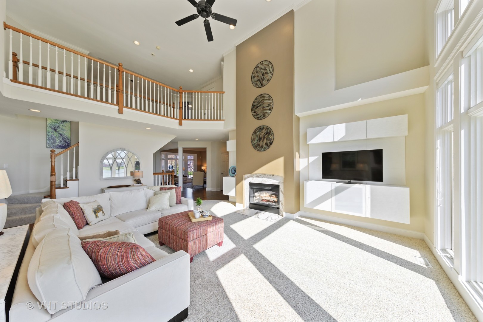 3651 White Eagle Drive Naperville, IL 60564 - Photo 15 of 47 a living room with furniture and a flat screen tv