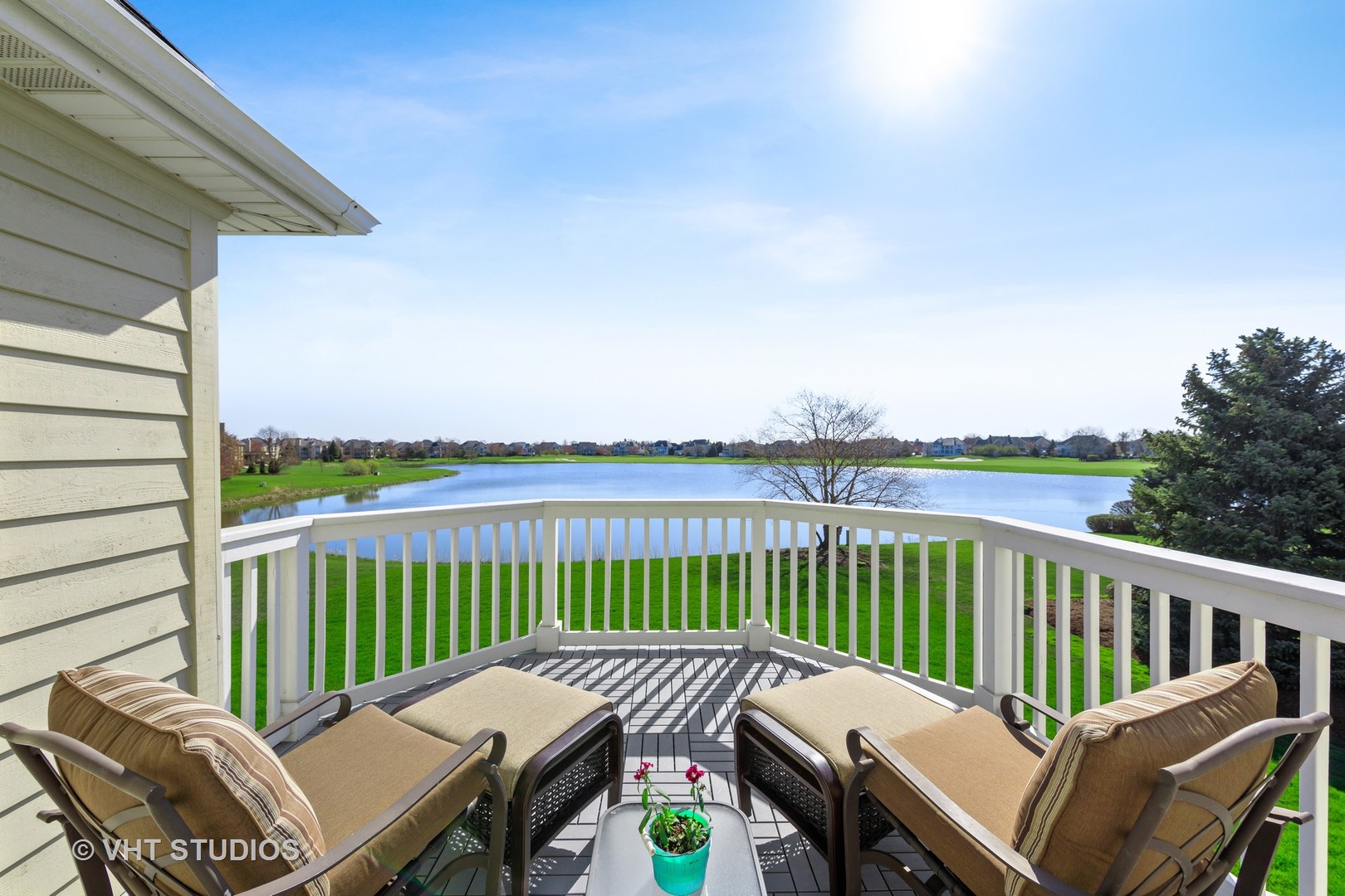 3651 White Eagle Drive Naperville, IL 60564 - Photo 21 of 47 a view of a two chairs and table on the roof deck