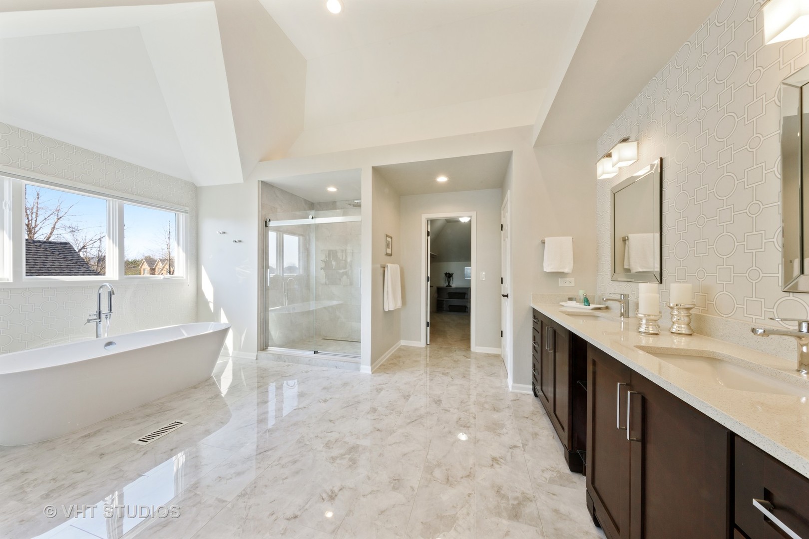 3651 White Eagle Drive Naperville, IL 60564 - Photo 23 of 47 a large bathroom with a double vanity sink a large mirror and shower