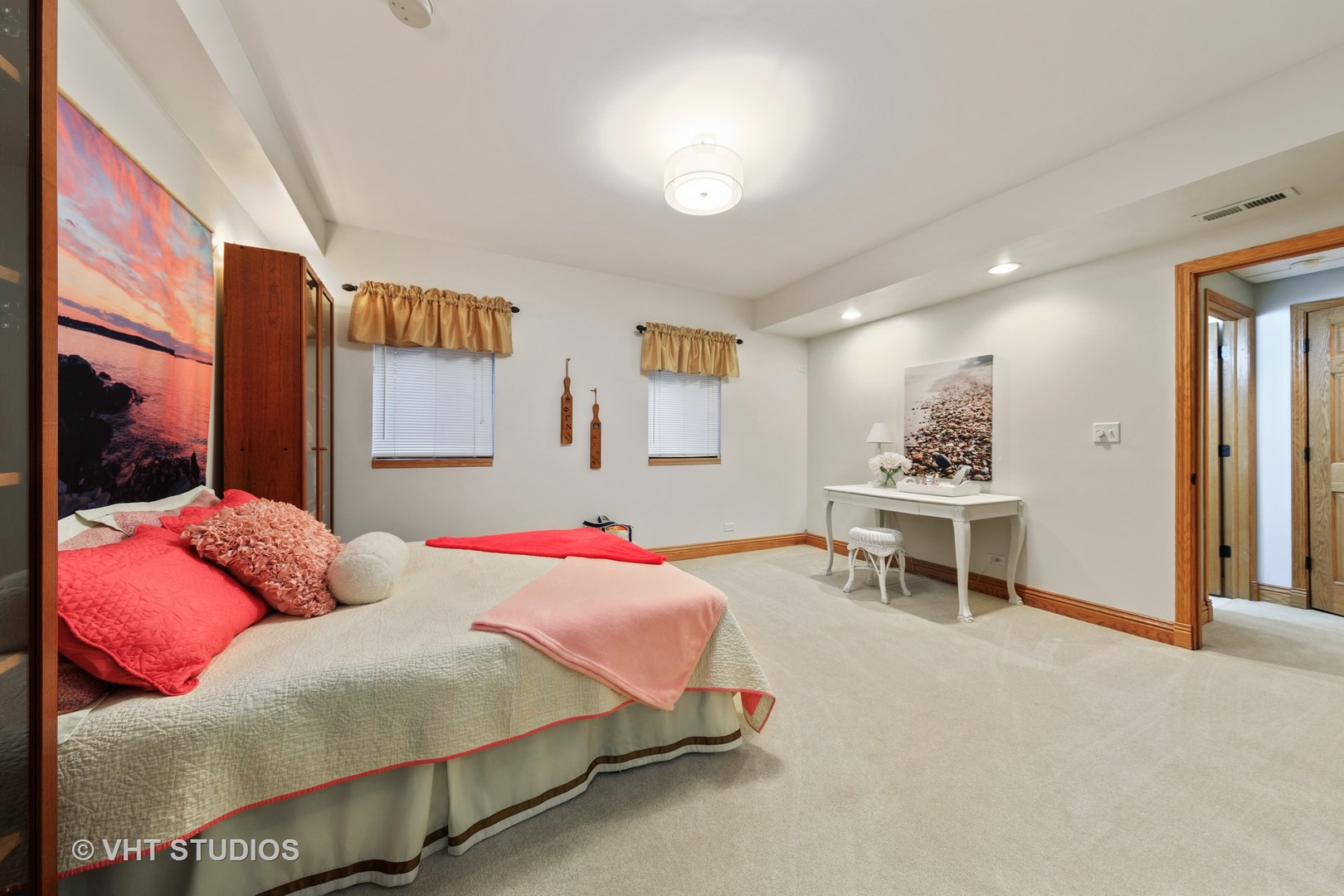 3651 White Eagle Drive Naperville, IL 60564 - Photo 32 of 47 a bedroom with a bed and a table