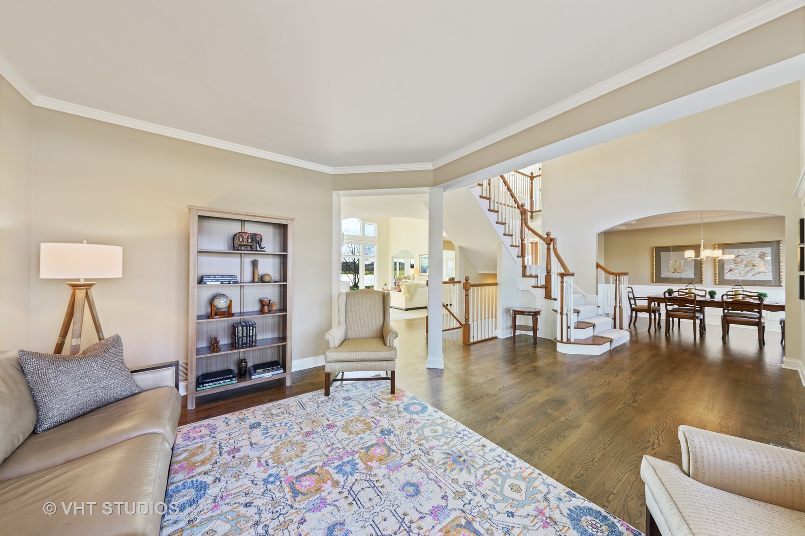 3651 White Eagle Drive Naperville, IL 60564 - Photo 5 of 47 a living room with furniture and a dining table with rug floor