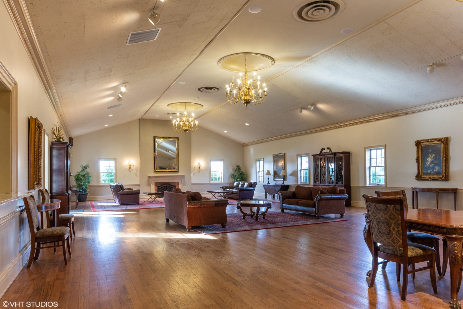3651 White Eagle Drive Naperville, IL 60564 - Photo 46 of 47 a living room with lots of furniture and chandelier