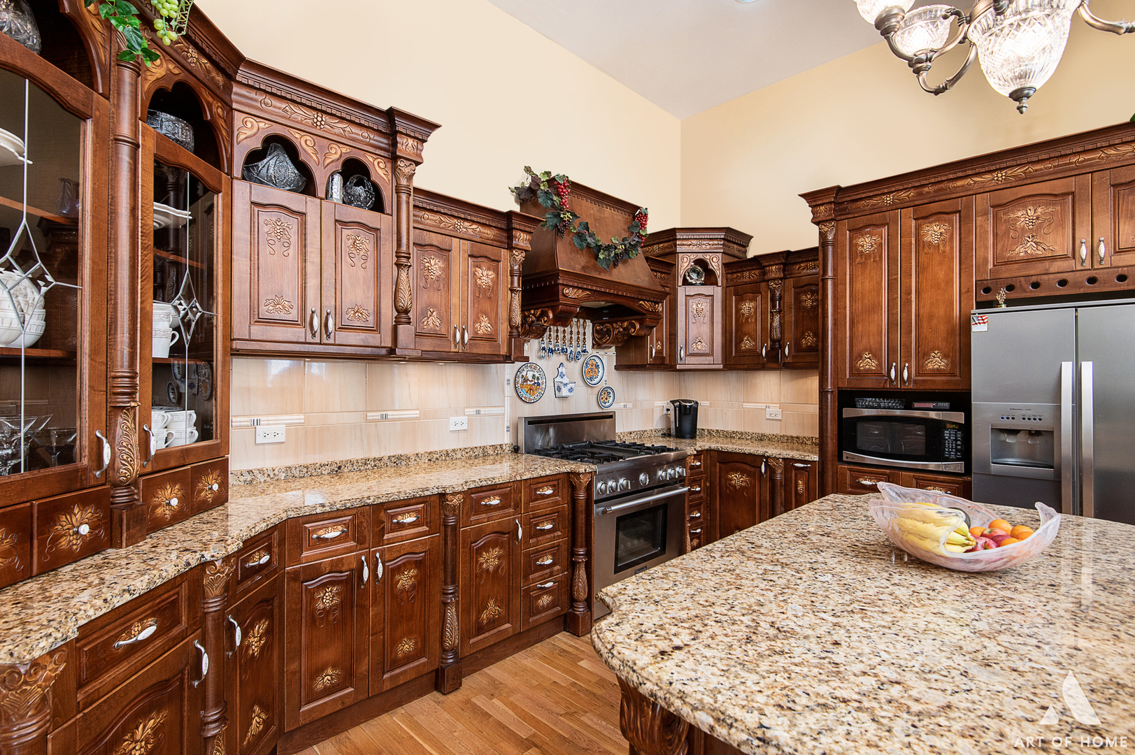 14940 El Greco Street Lemont, IL 60439 - Photo 18 of 67 a kitchen with stainless steel appliances granite countertop a stove refrigerator and cabinets
