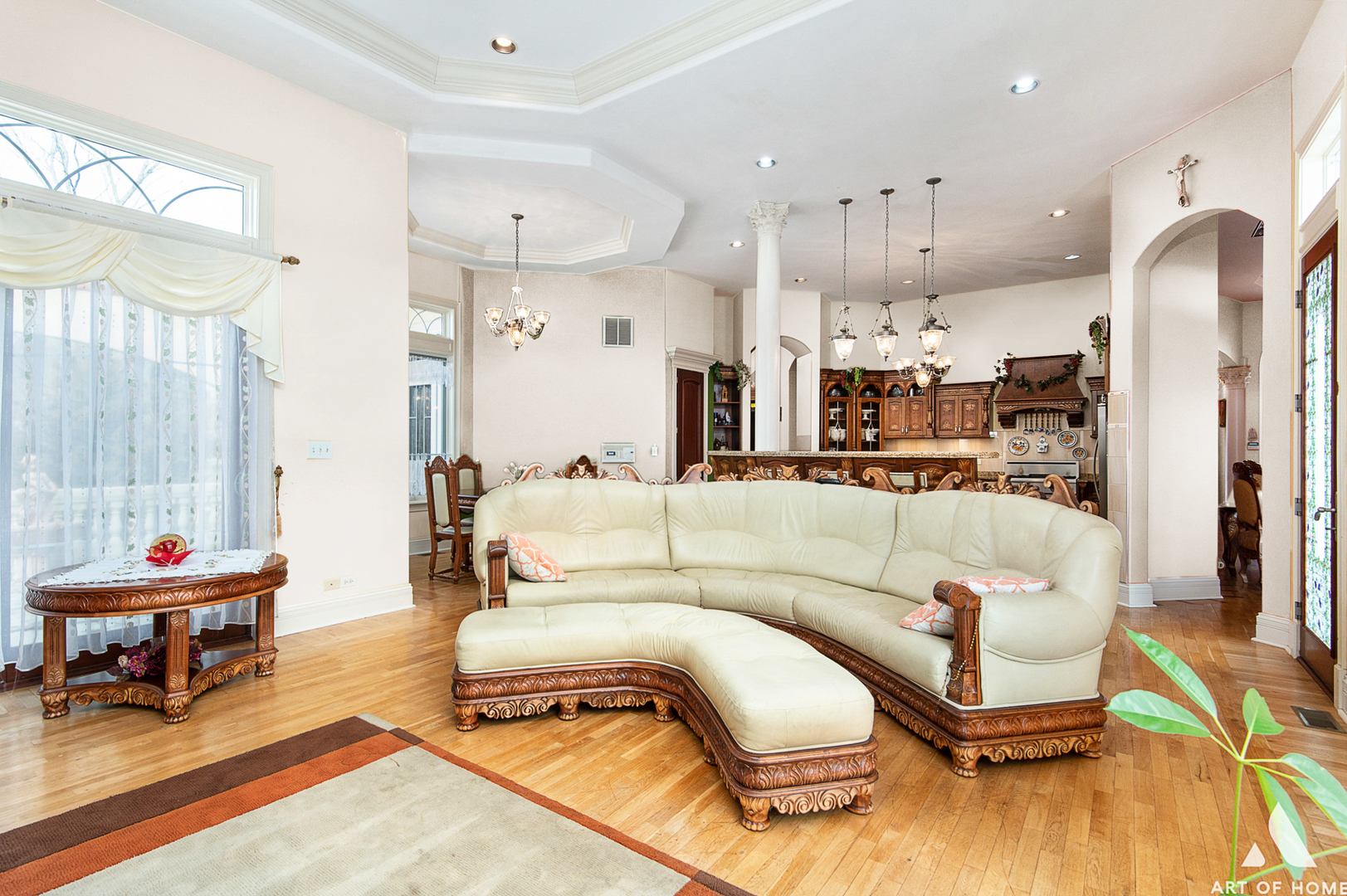14940 El Greco Street Lemont, IL 60439 - Photo 23 of 67 a living room with furniture and a chandelier